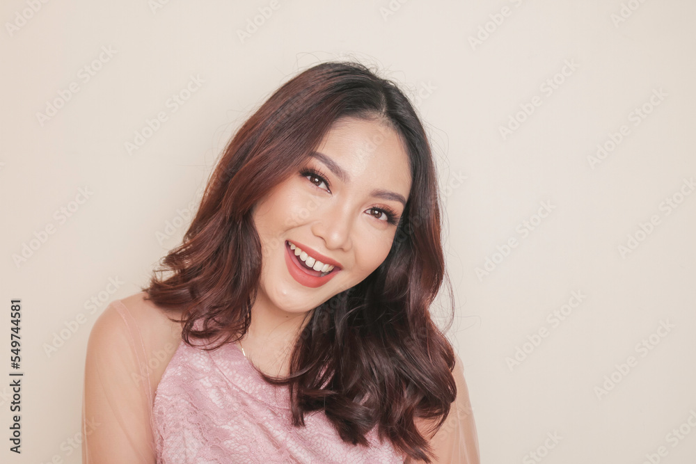 Fototapeta premium Close-up beauty face of Asian young model touching clean skin. Natural nude make-up. Skincare beauty facial treatment, spa, female health concept.