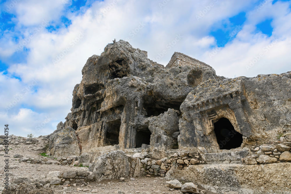 Naklejka premium Tlos ruins and tombs, an ancient Lycian city near the town of Seydikemer, Mugla, Turkey. 