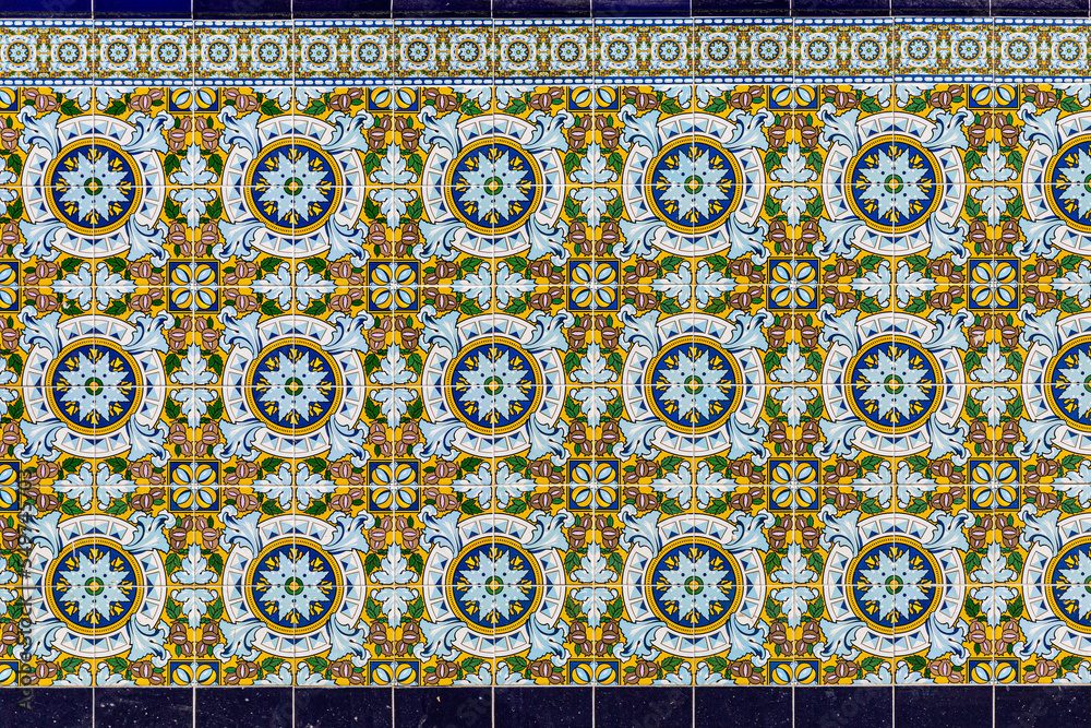 Hiszpańskie kafelki azulejos niebiesko żółte - obrazy, fototapety, plakaty 