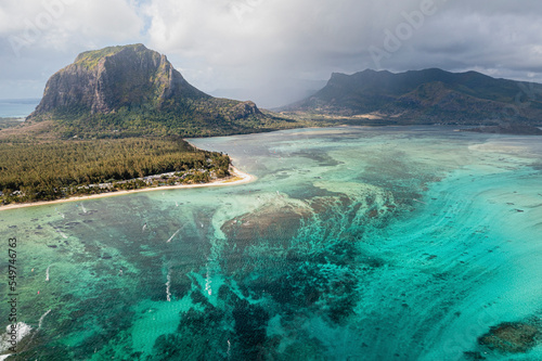 Panoramic aerial view of Le Morne mountain with famous underwater waterfall, Le Morne Brabant, Mauritius.