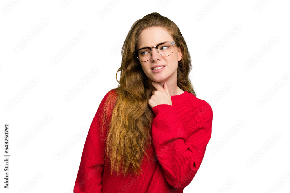 Young caucasian redhead woman isolated suffers pain in throat due a virus or infection. Young caucasian redhead woman isolated suffers pain in throat due a virus or infection.