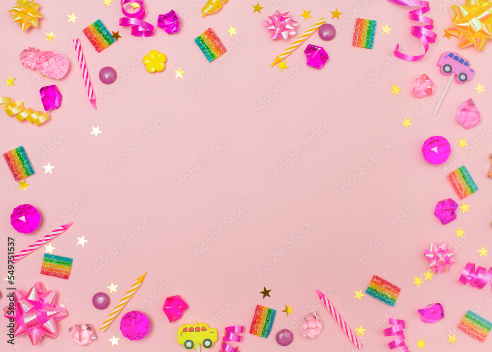 Children birthday party background with candels sweets cristals ribbons and confetti over pink background. Children birthday party background with candels sweets cristals ribbons and confetti over pink background.