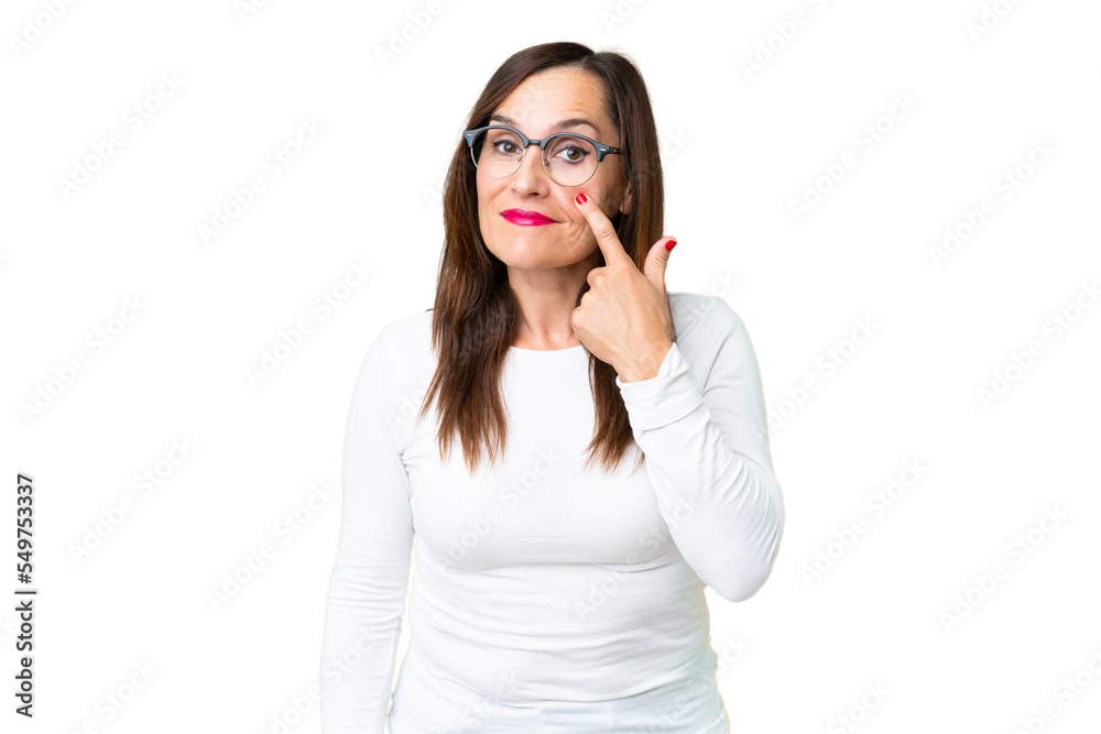 Middle age woman over isolated chroma key background showing something Middle age woman over isolated chroma key background showing something