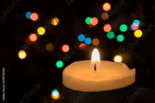 Christmas candle bokeh coloured lights blurred background