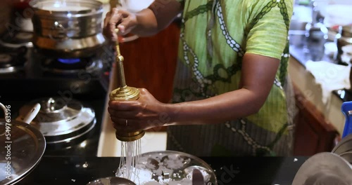 Process of cooking diyappam also known as string hopper, indiappa noolputtu nool photo