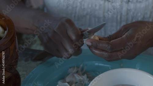 Peeling garlic by hand