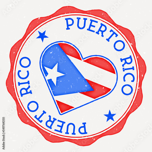 Puerto Rico heart flag logo. Country name text around Puerto Rico flag in the shape of a heart. Charming vector illustration.