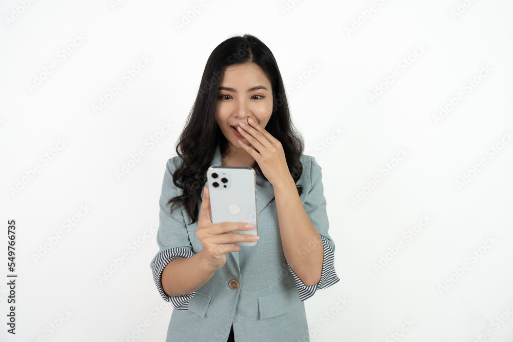 Surprise asian beautiful woman using smartphone isolated on white background. Surprise asian beautiful woman using smartphone isolated on white background.
