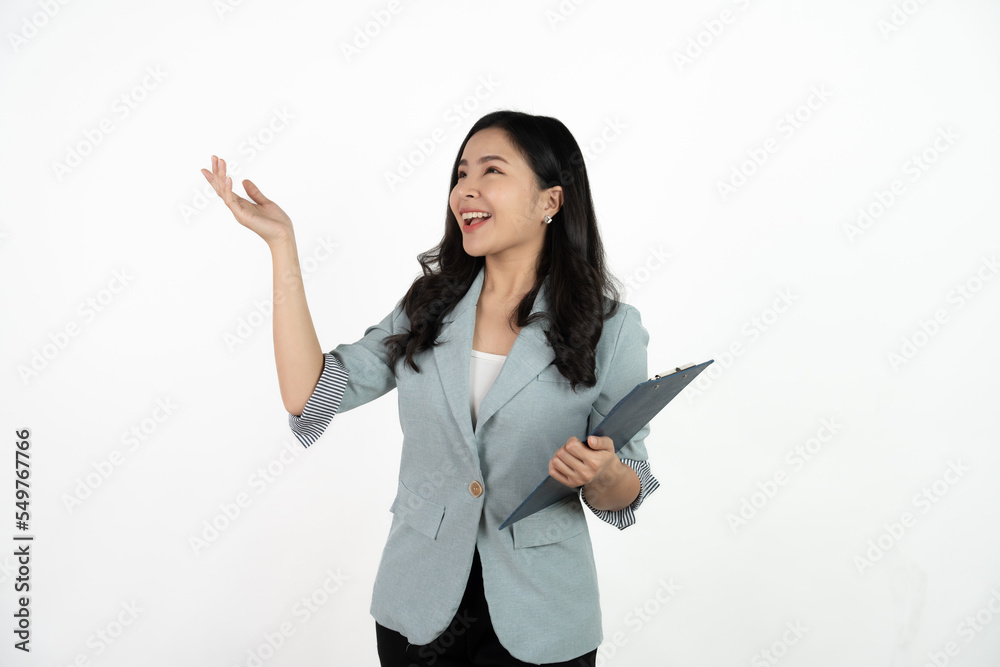 Portrait happy beautiful young asian business woman long hair standing and holding clipboard with looking to camera and smile over white background. Portrait happy beautiful young asian business woman long hair standing and holding clipboard with looking to camera and smile over white background.