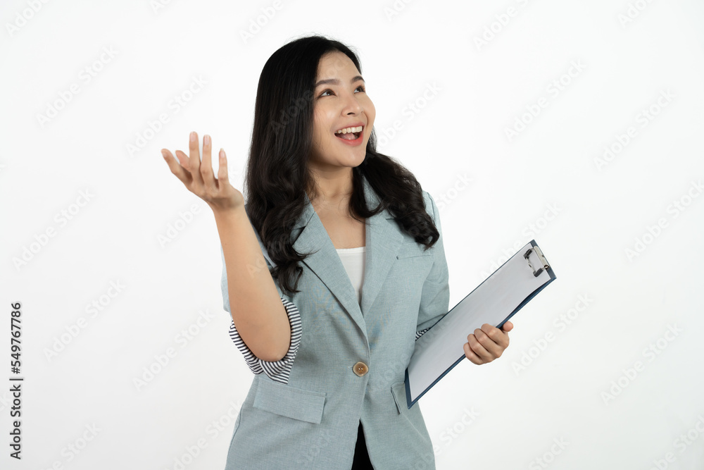 Portrait happy beautiful young asian business woman long hair standing and holding clipboard with looking to camera and smile over white background. Portrait happy beautiful young asian business woman long hair standing and holding clipboard with looking to camera and smile over white background.
