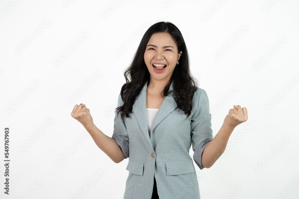 Excited young asian woman with raised hand celebrating success Portrait cheerful positive asian female with raised hands and fists open mouth Girl get happy enjoy life white background copy space. Excited young asian woman with raised hand celebrating success Portrait cheerful positive asian female with raised hands and fists open mouth Girl get happy enjoy life white background copy space.
