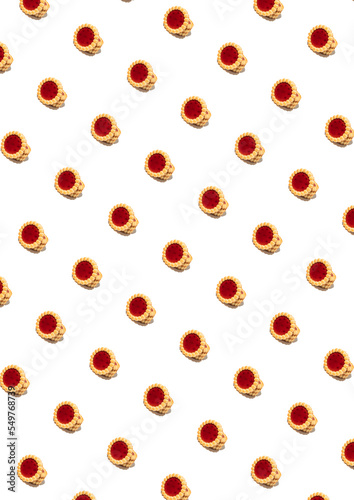 Pattern made with strawberry cookies and white background