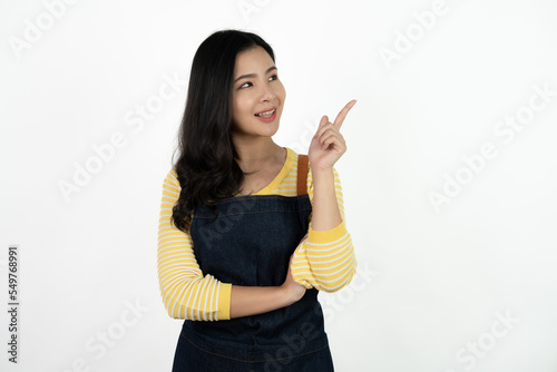 Portrait of asian waitress beaufitul female is posing in the studio with happy smiling at isolate on white background studio. photo