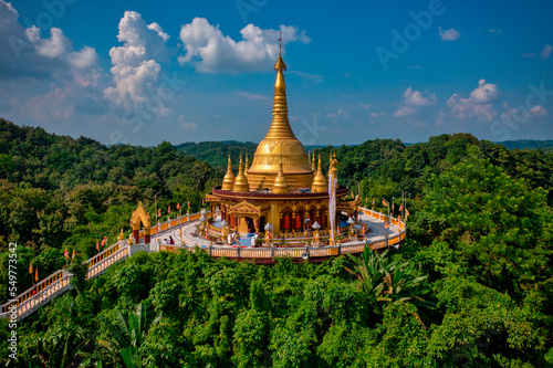 Aerial view of Bandarban temple with golden dome and big statue, Bandarban, Chittagong province, Bangladesh. photo