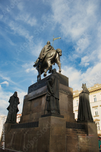 Statue of St Wenceslas under sky, from behind. Prague. Czech Republic. photo