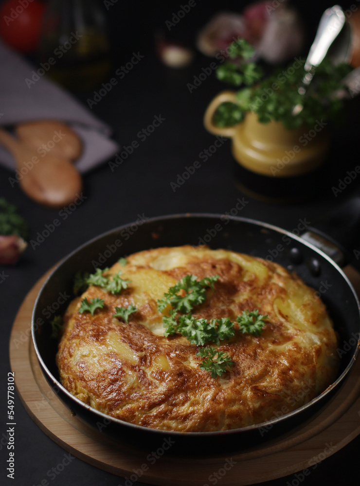 Traditional Spanish dish tortilla on the table Traditional Spanish dish tortilla on the table