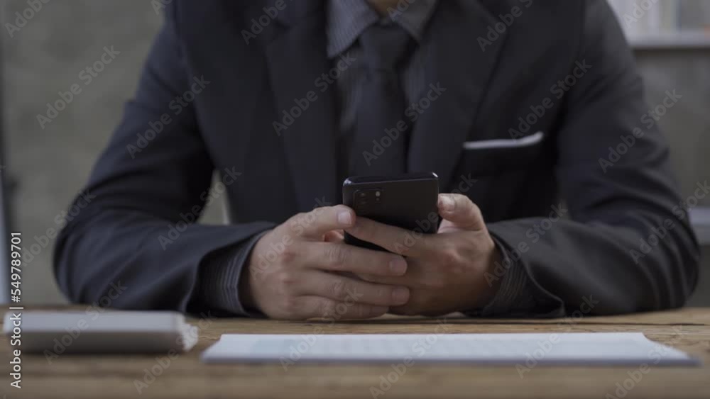 Lawyer office concept of online legal advice and legal advice. Lawyer Judge Sitting At Table With Paper Smartphone And Hammer Golden Scales Of Justice 4K Lawyer office concept of online legal advice and legal advice. Lawyer Judge Sitting At Table With Paper Smartphone And Hammer Golden Scales Of Justice 4K