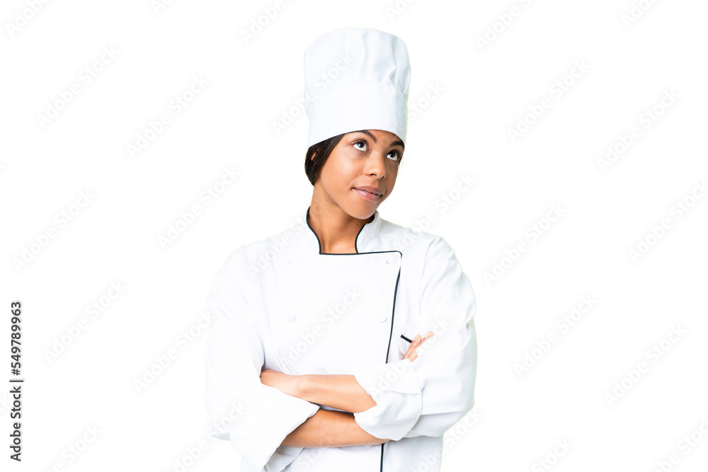Young African American chef over isolated chroma key background making doubts gesture while lifting the shoulders Young African American chef over isolated chroma key background making doubts gesture while lifting the shoulders