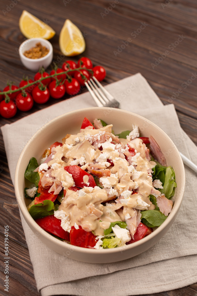 Mix of lettuce leaves with smoked chicken meat, tomatoes and salted soft cheese, with mustard-lemon dressing Mix of lettuce leaves with smoked chicken meat, tomatoes and salted soft cheese, with mustard-lemon dressing