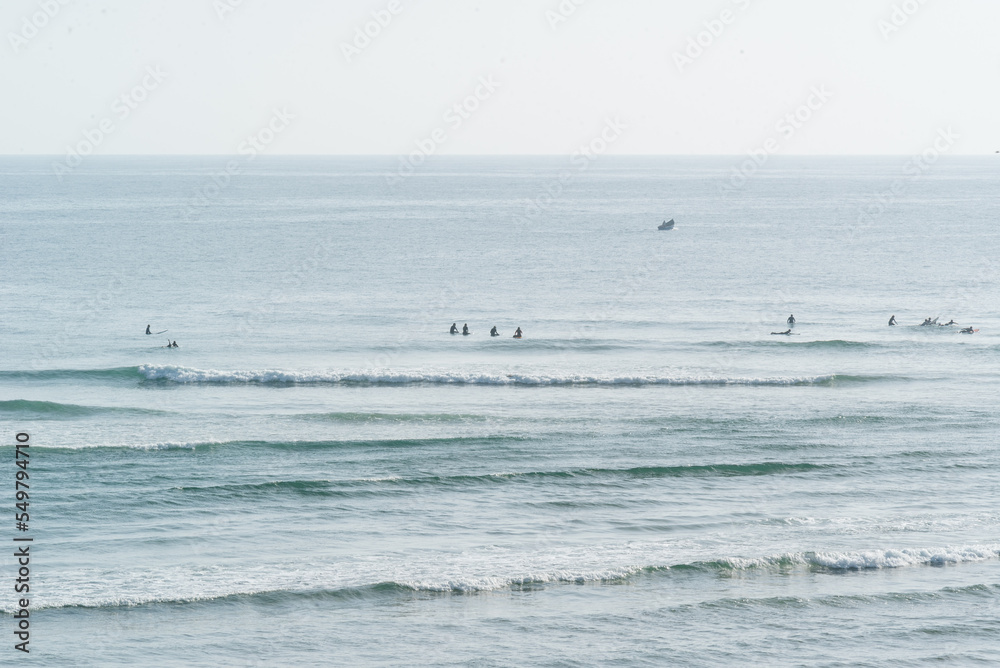 Longboard surfers at the line up at Atlantic Ocean, Imsouane, Morocco Longboard surfers at the line up at Atlantic Ocean, Imsouane, Morocco