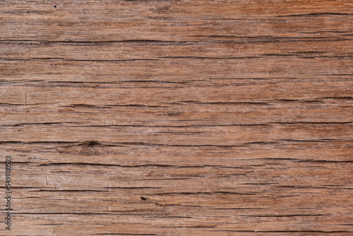 Old wooden background with cracks. Structure of an old wood close up. Brown colored texture natural wood