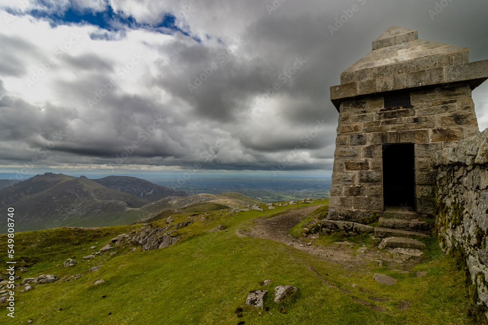 The Mourne wall at the top of Slieve Donnard. Panoramic view from the pek of the mountain. Northern Ireland, UK