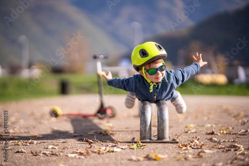 Boy playing in skate park photo