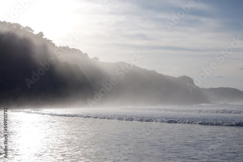 Sunset over a foggy beach in Costa Rica