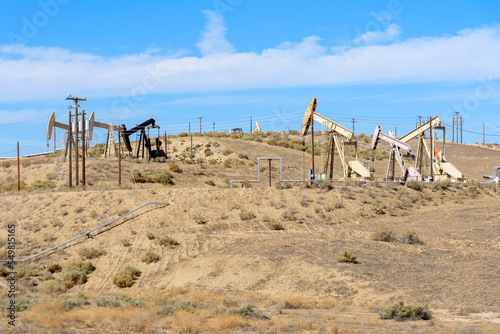 Pumpjacks in a oil field on a clear autumn day