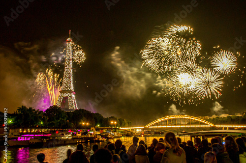 Photography Fireworks over the Seine in Paris, France on Bastille Day.