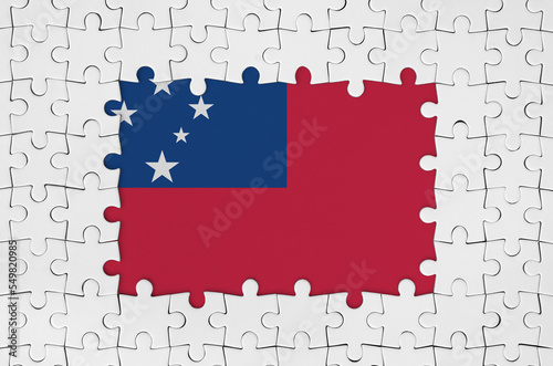 Samoa flag in frame of white puzzle pieces with missing central part photo