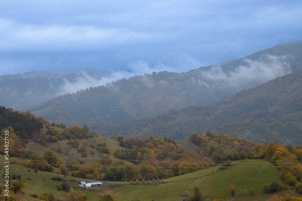 Hill and forest view on a beautiful autumn day in Arges County, Romania