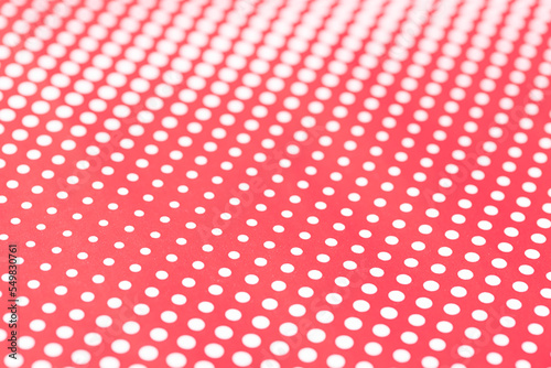 Red and white abstract background. Halftone pattern paper design. Selective focus