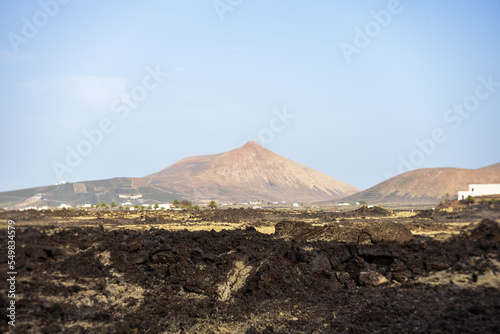 Typical landscape of Lanzarote. Canary Islands. Spain. Art lens. Swirl bokeh. Focus on the center.