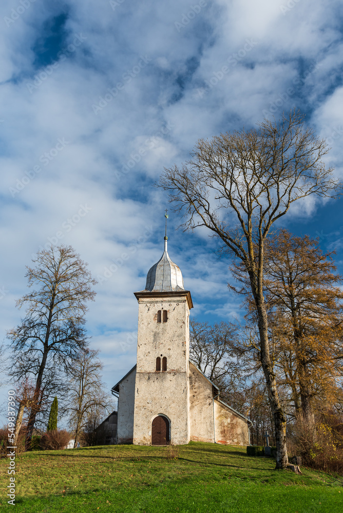 Vecpils Catholic church in sunny autumn day, Latvia.