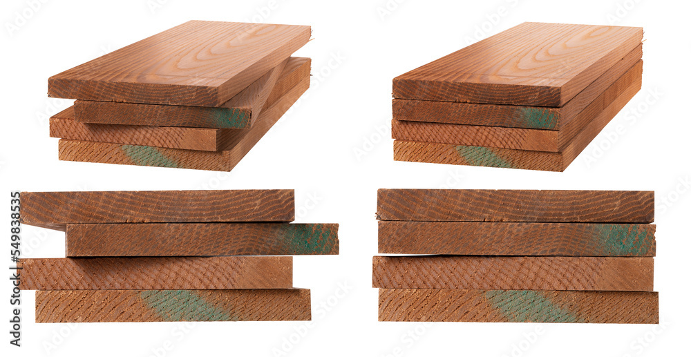A pile of raw boards on an isolated background. A pile of raw boards on an isolated background.