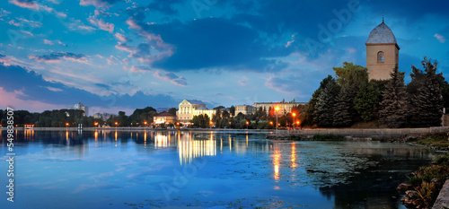 Panorama with reflection in the water at evening time. Europe, Ukraine, Terno...