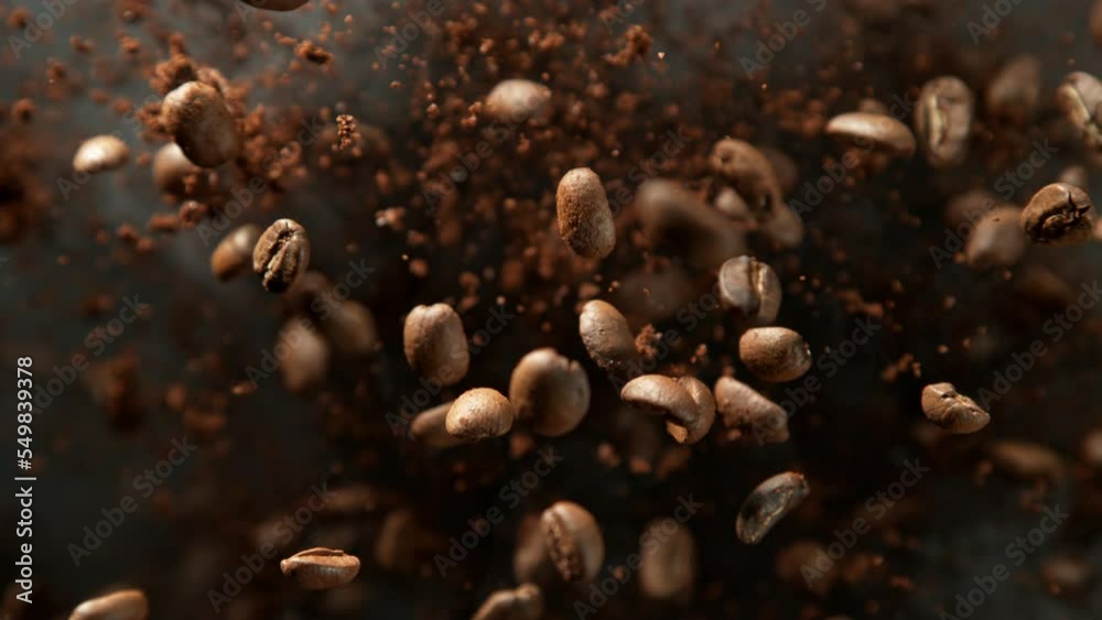 Super Slow Motion Shot of Ground Coffee and Fresh Beans Explosion Towards Camera at 1000fps. Super Slow Motion Shot of Ground Coffee and Fresh Beans Explosion Towards Camera at 1000fps.