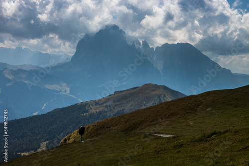 Clouds over mountain massif Odle in Dolomites
