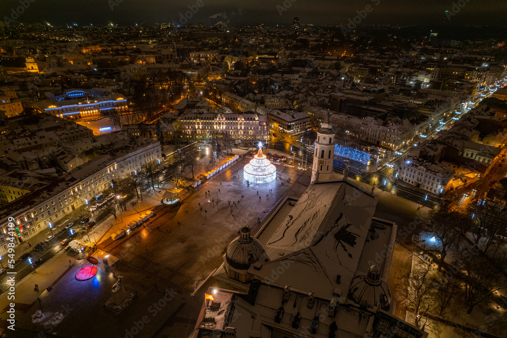 Aerial winter night view of Vilnius Christmas Tree, Vilnius old town, Lithuania