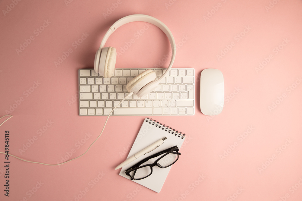 Headphones, keyboard and notepad Headphones, keyboard and notepad
