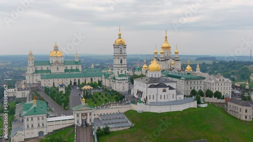 Aerial view of Pochaev Monastery, Orthodox Church, Pochayiv Lavra at day, Ukraine. Pochayiv Lavra in morning. View from the hills photo