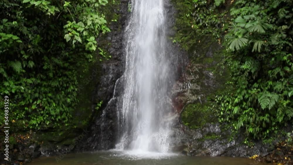 Big waterfall in the rainforest Camera pans from top to bottom 4K Big waterfall in the rainforest Camera pans from top to bottom 4K