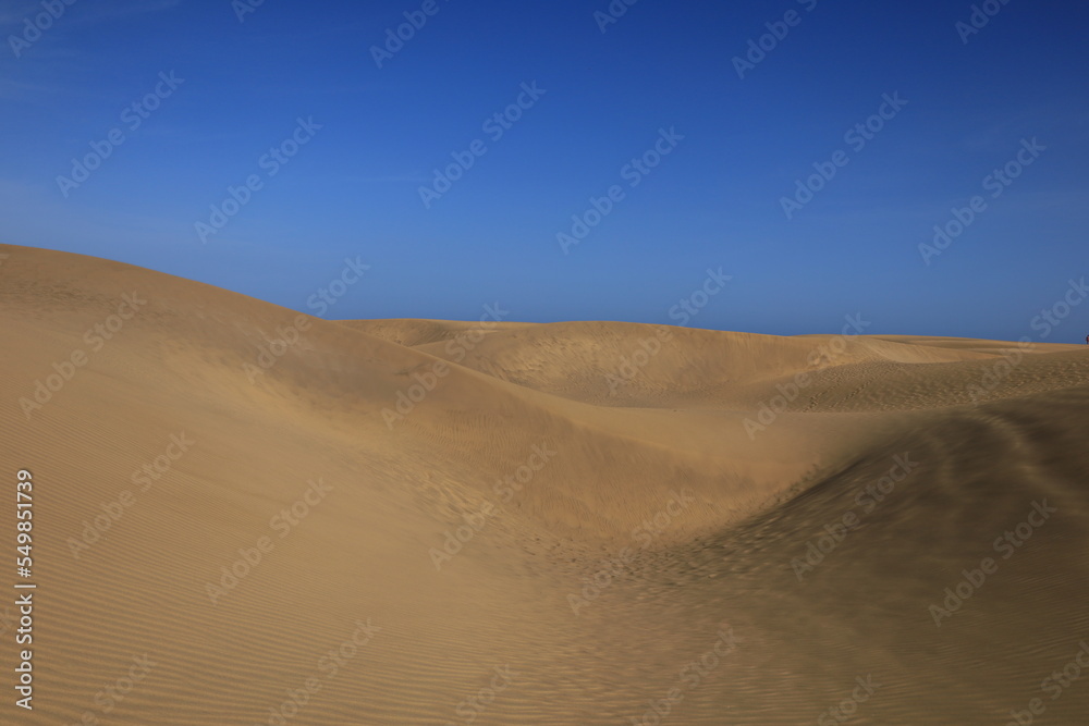 The Maspalomas dunes are sand dunes located on the southern coast of the island of Gran Canaria in the Canary Islands