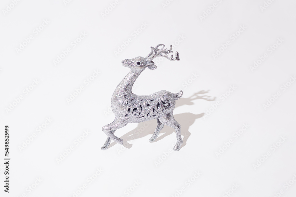 Obraz premium Deer on a white background. Minimal design with copy space.