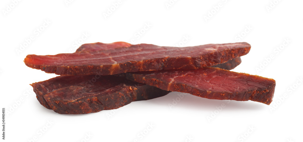 Pieces of delicious beef jerky on white background Pieces of delicious beef jerky on white background