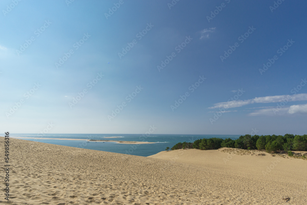 Sandy dune du Pilat, the biggest sand dune in Europe with the pine forest and view at the atlantic ocean, Arcachon, Nouvelle-Aquitaine, France
