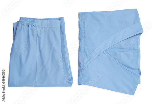 Light blue medical uniforms isolated on white , top view