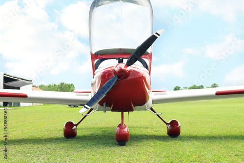 New ultralight aircraft on green grass outdoors photo