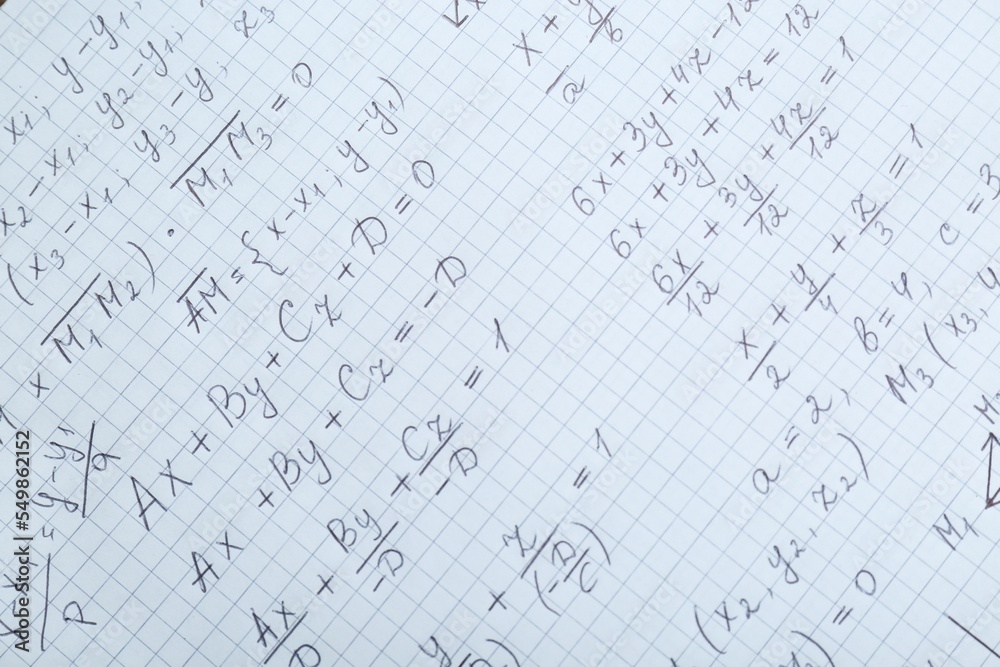 Sheet of paper with different mathematical formulas, top view Sheet of paper with different mathematical formulas, top view